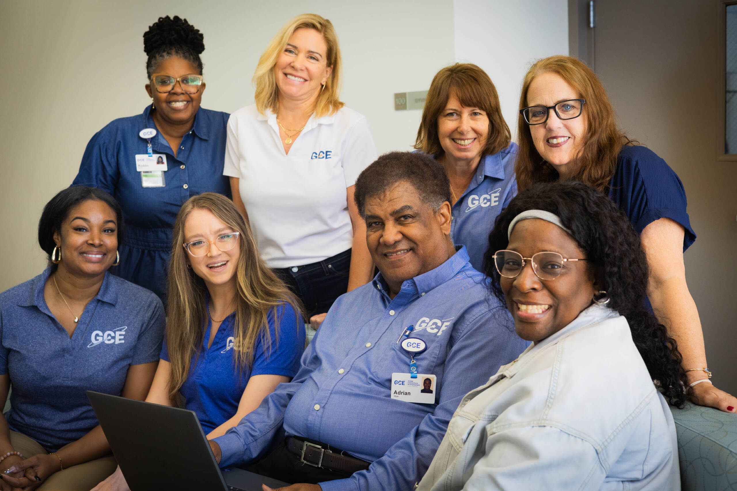 GCE team smiling at the camera