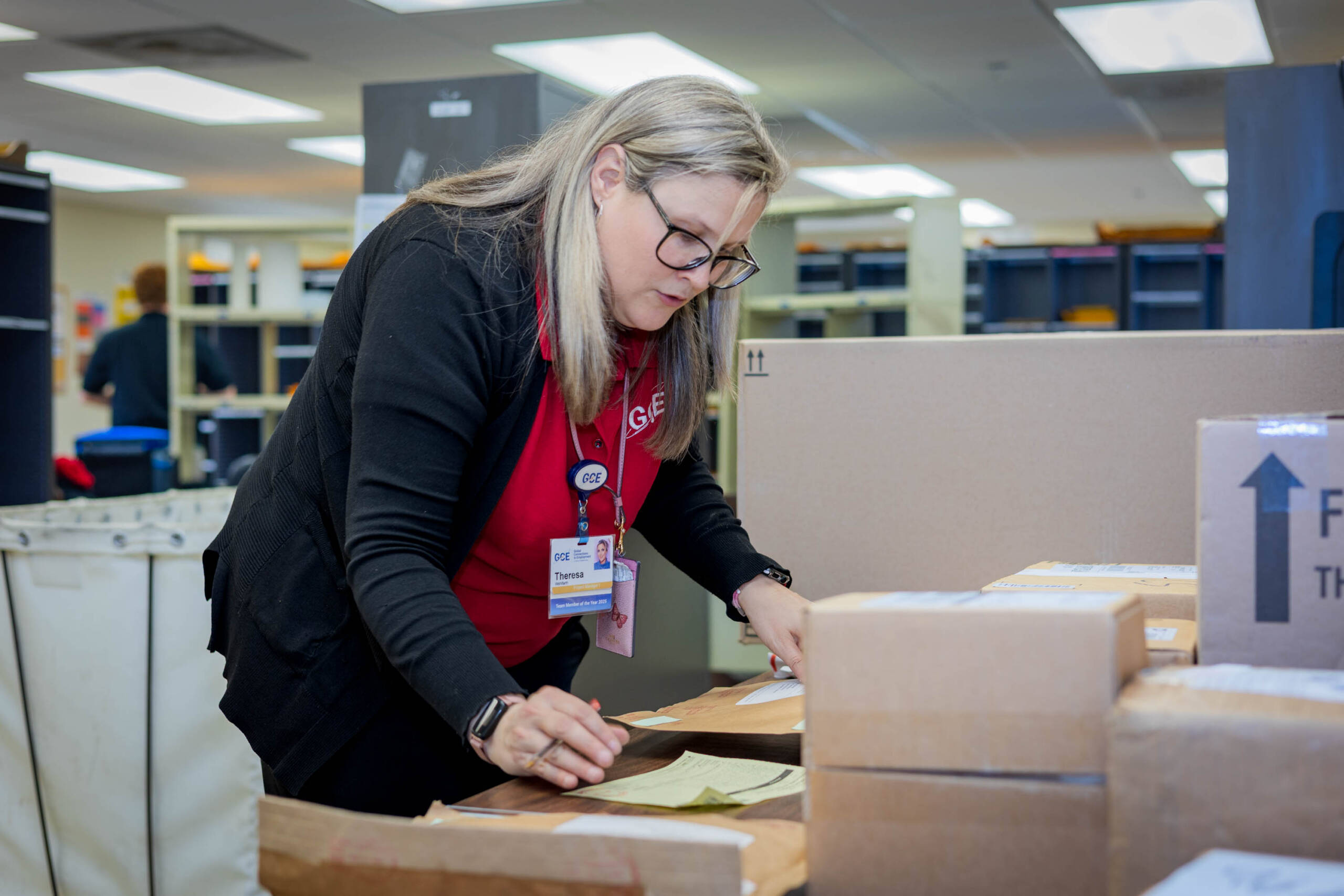 Woman sorting mail
