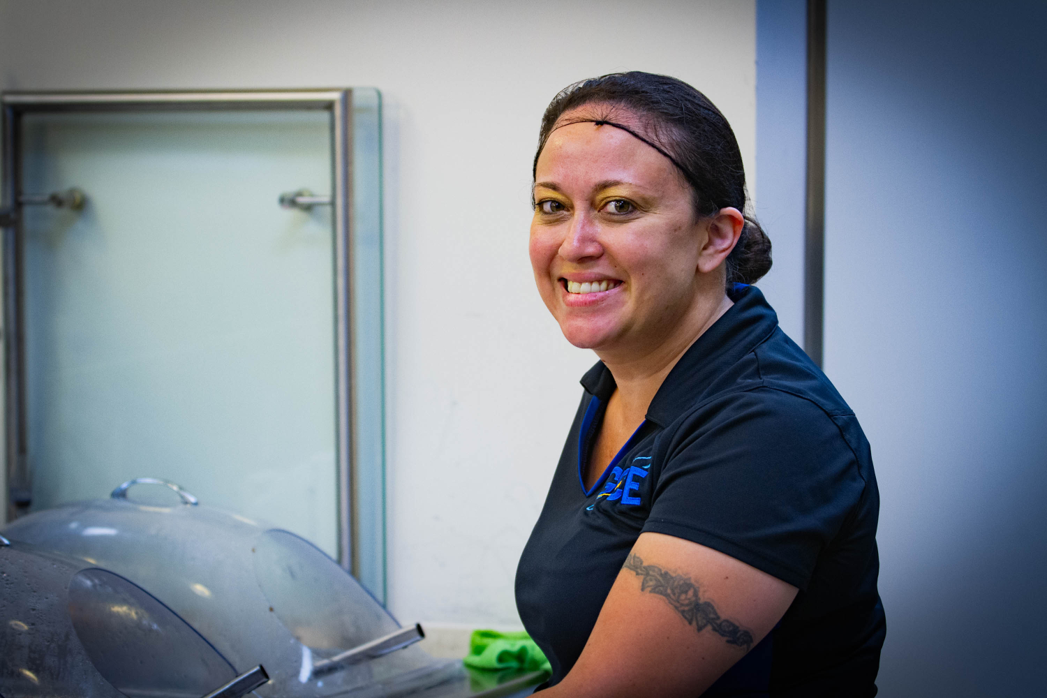 Food service worker in the serving line of a dining hall