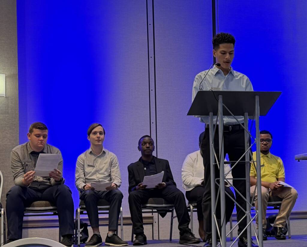 Photo of a male Project SEARCH intern speaking at graduation